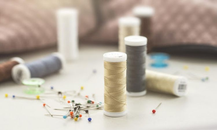 Pins, thread, and cloth