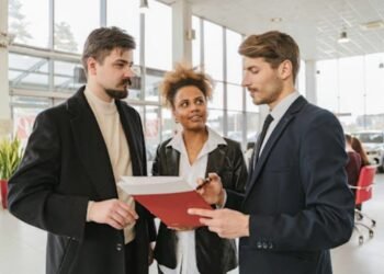 a couple checking car for sale at a Brisbane Mitsubishi dealership